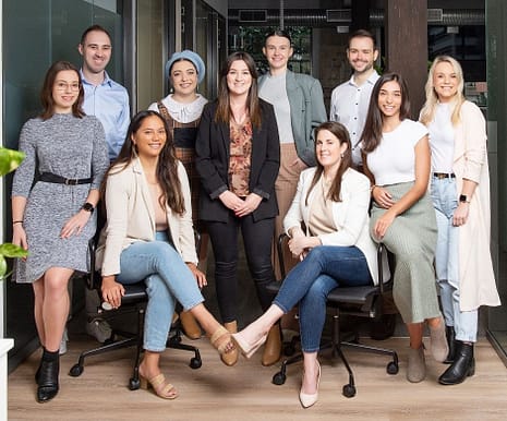 Brisbane Digital Marketing Team standing in agency office